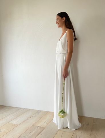 Jasmin Blommaert bruid jurk wijde rok top open rug boho